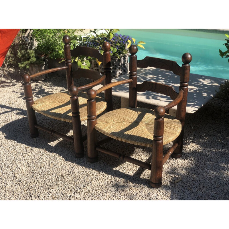 Pair of vintage oak and straw armchairs by Charles Dudouyt,1940s