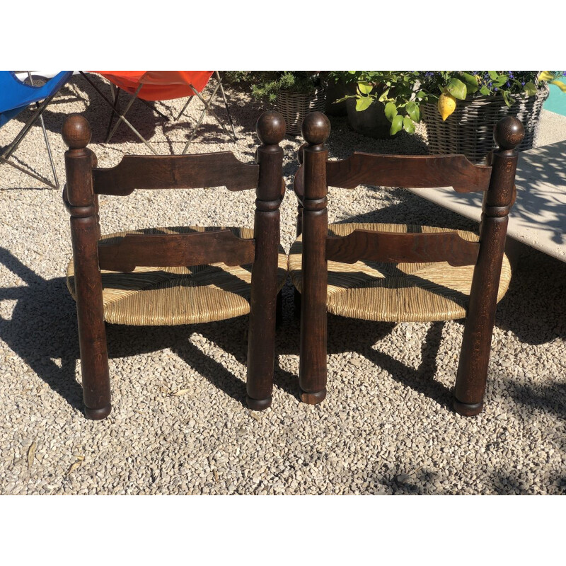 Pair of vintage oak and straw armchairs by Charles Dudouyt,1940s