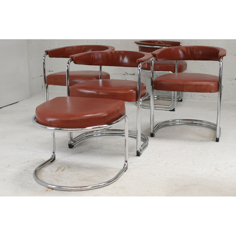 4 vintage buisvormige loungestoelen en bijpassende voetenbank, 1960