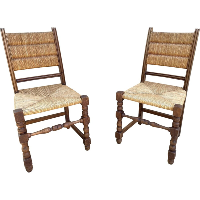 Paire de chaises vintage paillées par Charlotte PERRIAND