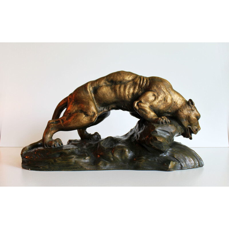 Sculpture of a lioness in terracotta by Armand Fagotto