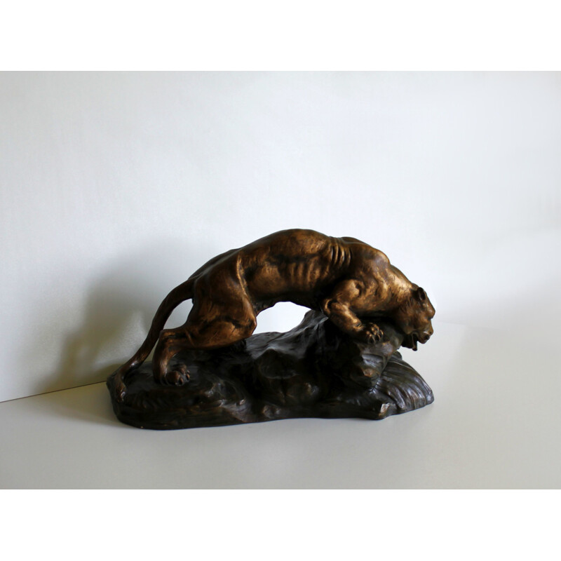 Sculpture of a lioness in terracotta by Armand Fagotto