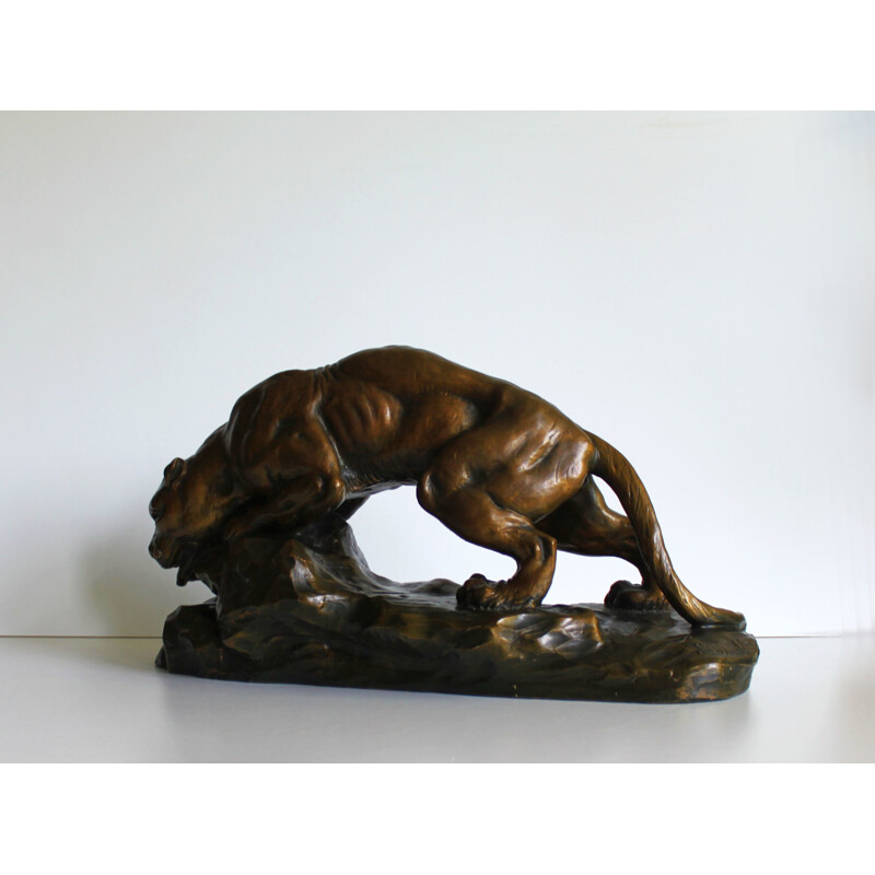 Sculpture of a lioness in terracotta by Armand Fagotto