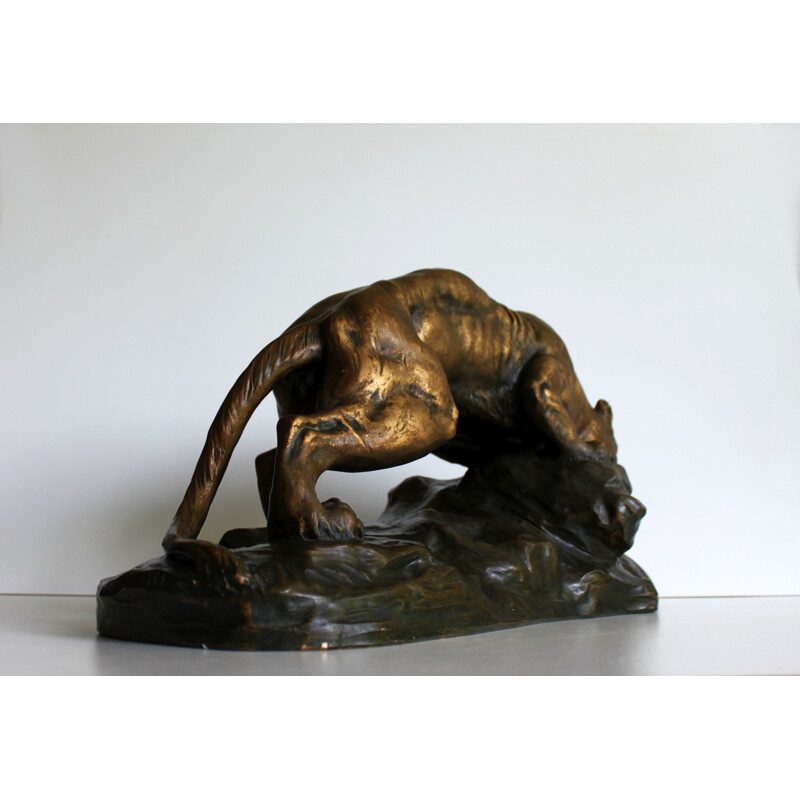 Sculpture of a lioness in terracotta by Armand Fagotto