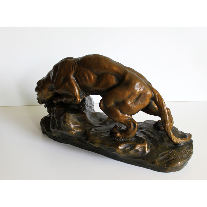 Sculpture of a lioness in terracotta by Armand Fagotto