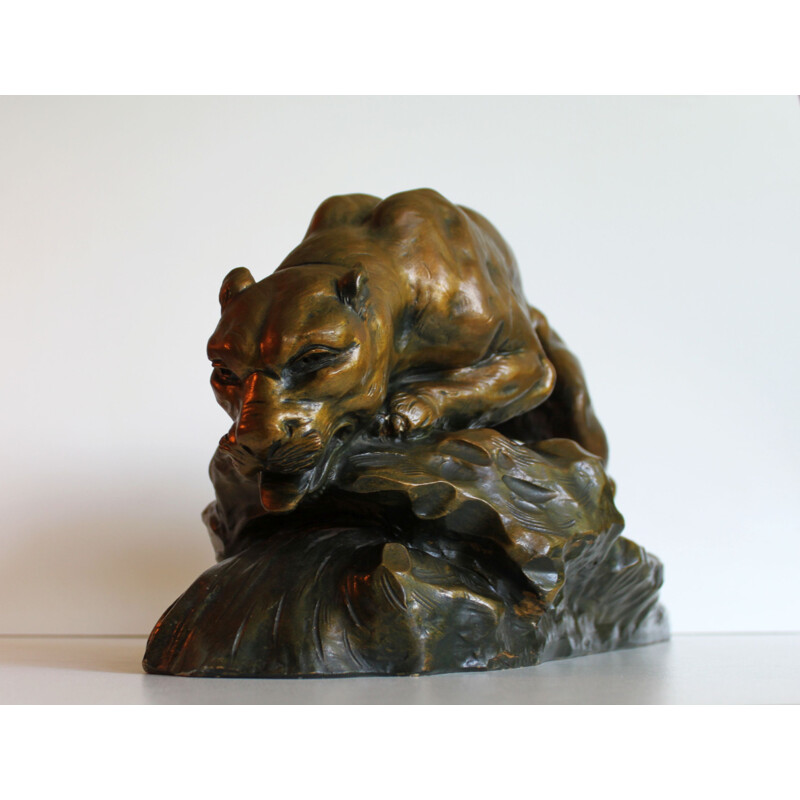 Sculpture of a lioness in terracotta by Armand Fagotto