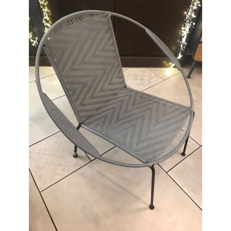 Vintage woven armchair with black metal base
