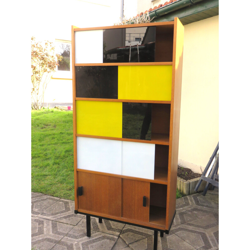 Modernist vintage teak bookcase with three-coloured sliding doors, France 1950