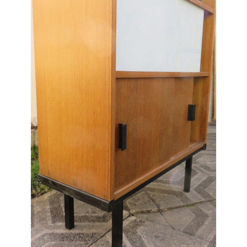 Modernist vintage teak bookcase with three-coloured sliding doors, France 1950