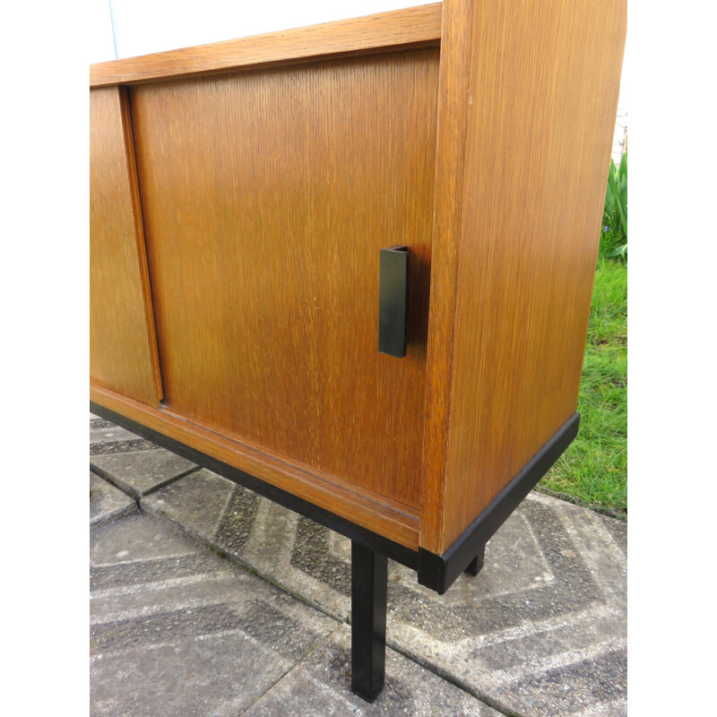 Modernist vintage teak bookcase with three-coloured sliding doors, France 1950