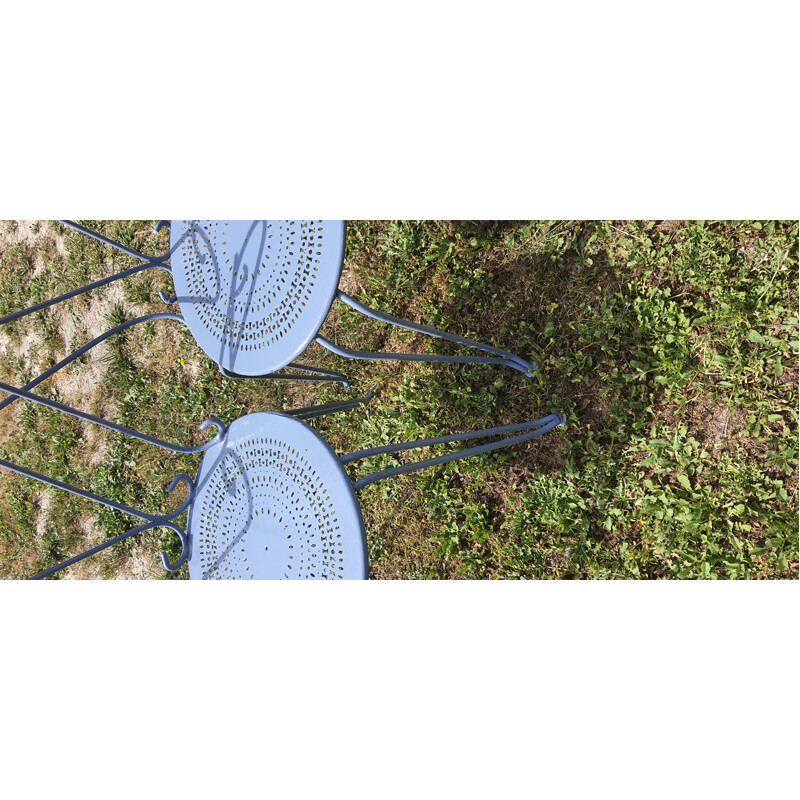 Vintage garden furniture table, armchairs and chairs in wrought iron blue colour