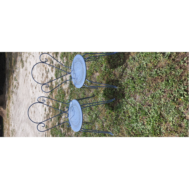Vintage garden furniture table, armchairs and chairs in wrought iron blue colour