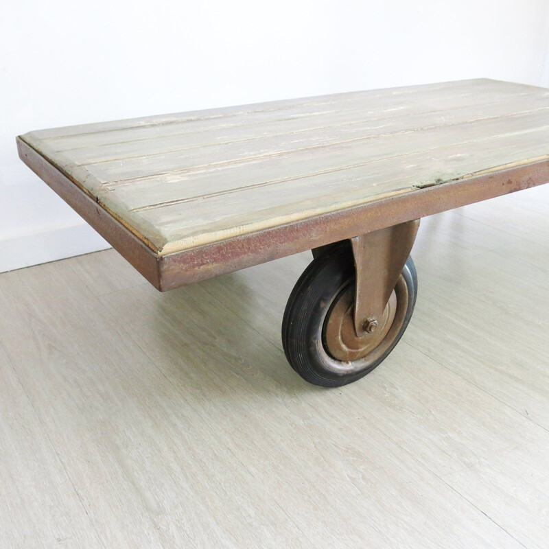 Industrial coffee table with one wheel