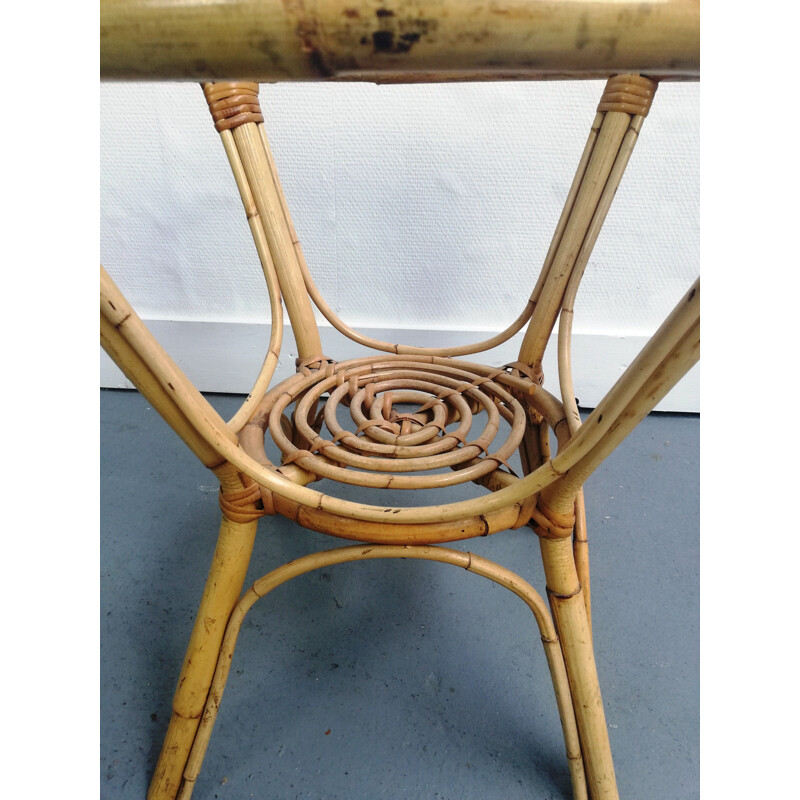 Round vintage coffee table in rattan