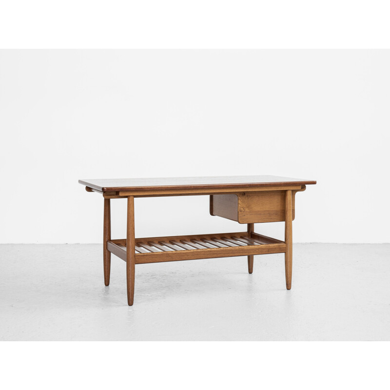 Mid century coffee table in oak and teak by Ejvind A. Johansson for FDB Møbler, Denmark 1960s