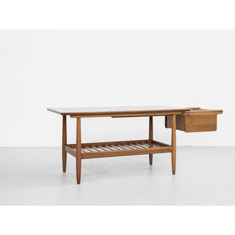 Mid century coffee table in oak and teak by Ejvind A. Johansson for FDB Møbler, Denmark 1960s