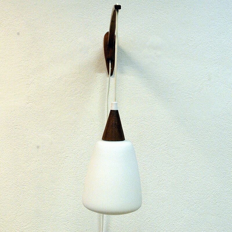 Vintage wall lamp of teak and opaline glass, Sweden 1950s