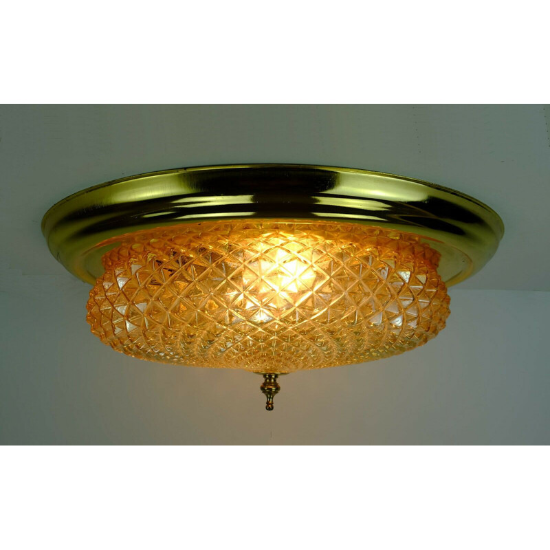 Mid century ceiling lamp flush mount textured amber glass and brass, 1970s