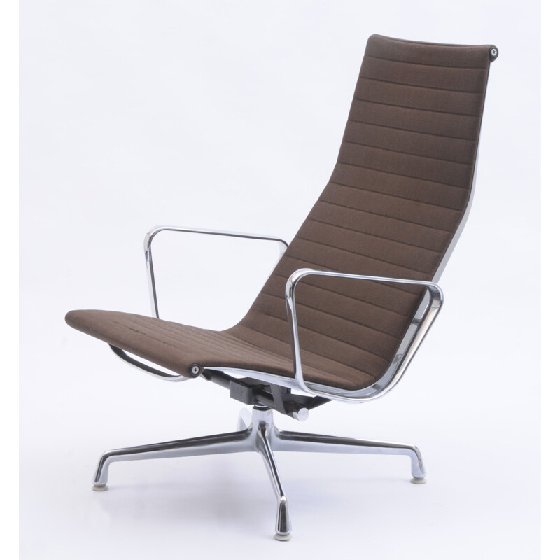 Vintage EA 124 swivel lounge chair by Charles and Ray Eames for Vitra