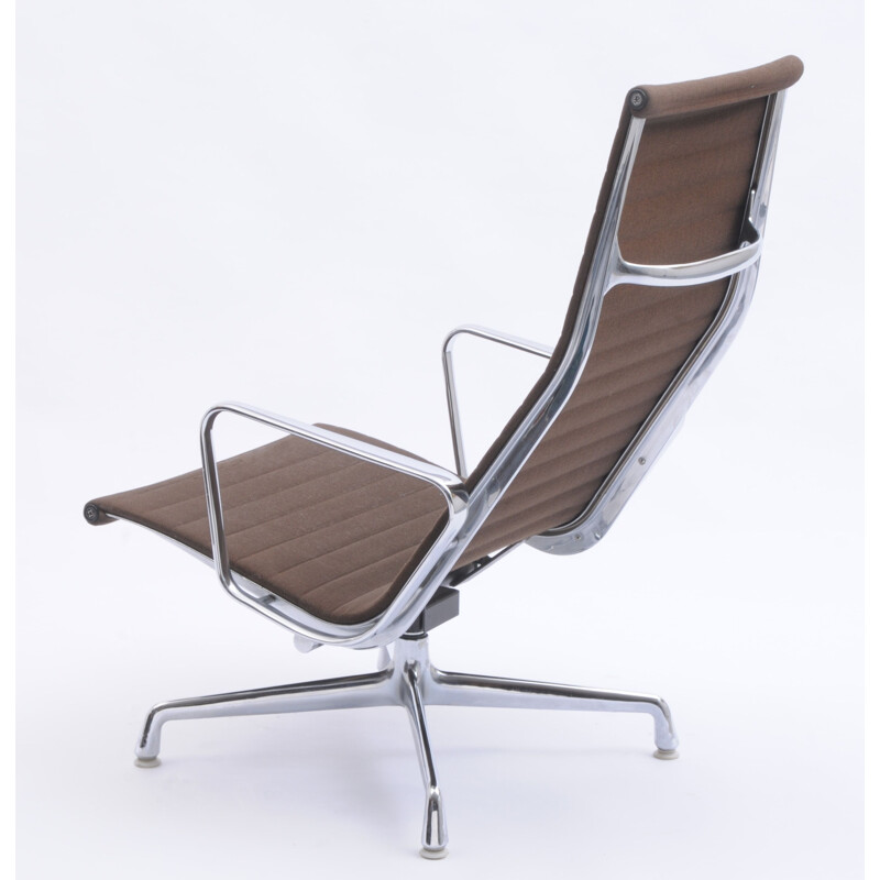 Vintage EA 124 swivel lounge chair by Charles and Ray Eames for Vitra