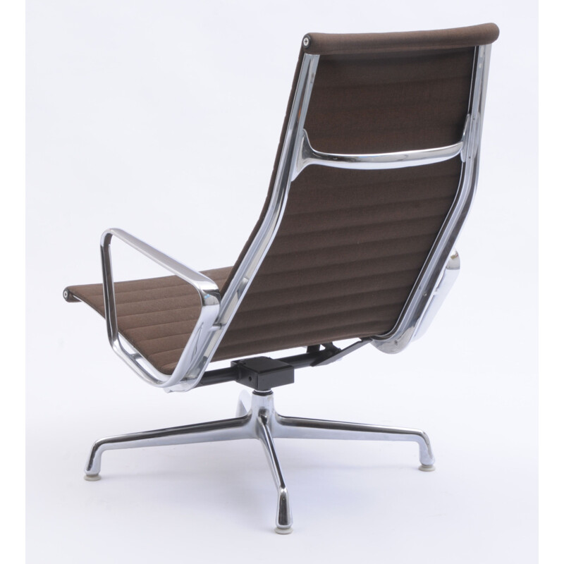 Vintage EA 124 swivel lounge chair by Charles and Ray Eames for Vitra