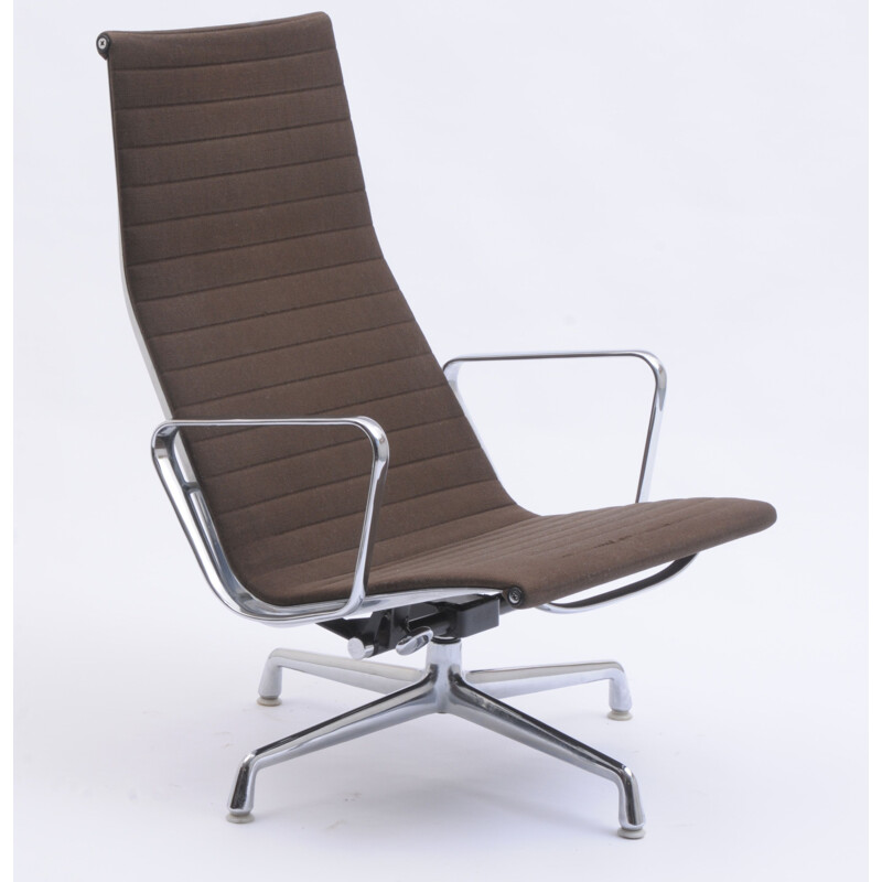 Vintage EA 124 swivel lounge chair by Charles and Ray Eames for Vitra