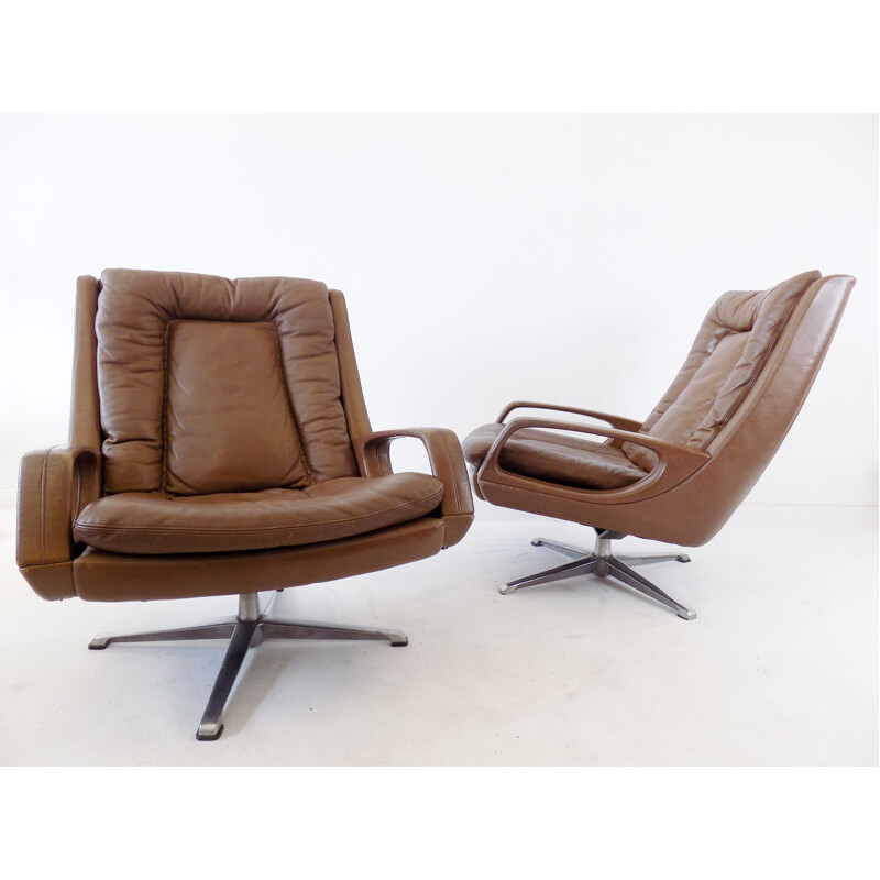 Pair of  brown leather lounge chairs by Carl Straub, 1960s