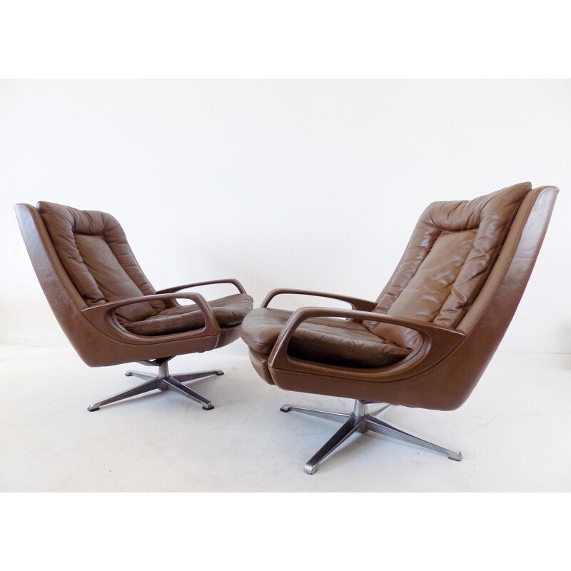 Pair of  brown leather lounge chairs by Carl Straub, 1960s
