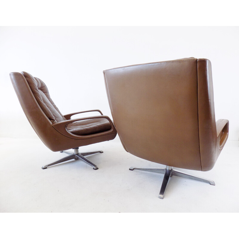 Pair of  brown leather lounge chairs by Carl Straub, 1960s