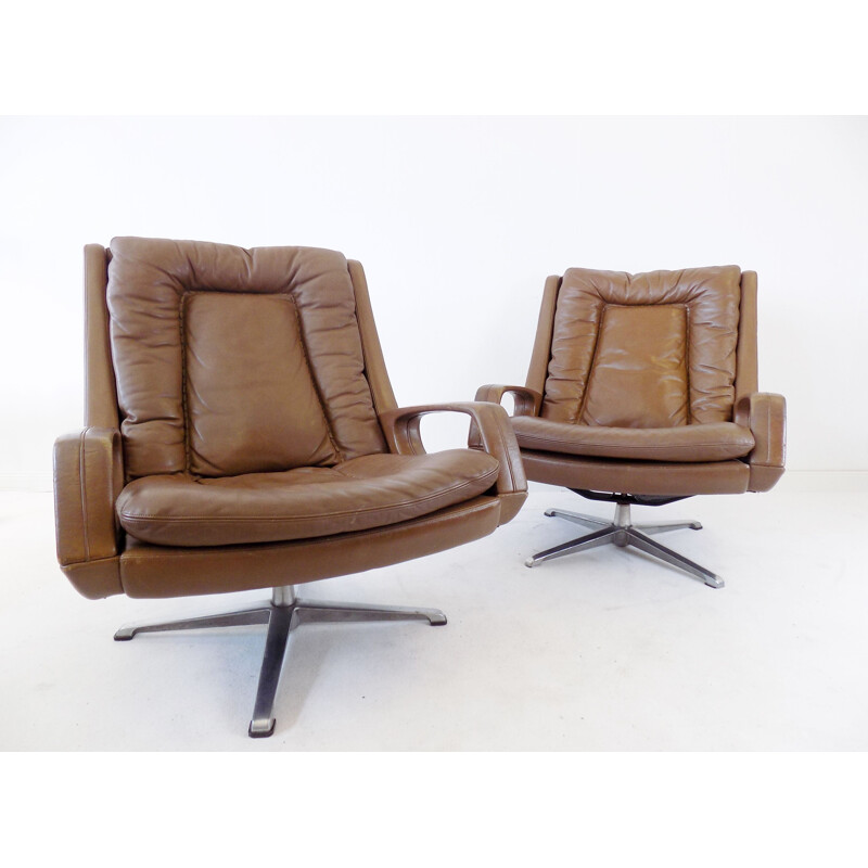 Pair of  brown leather lounge chairs by Carl Straub, 1960s