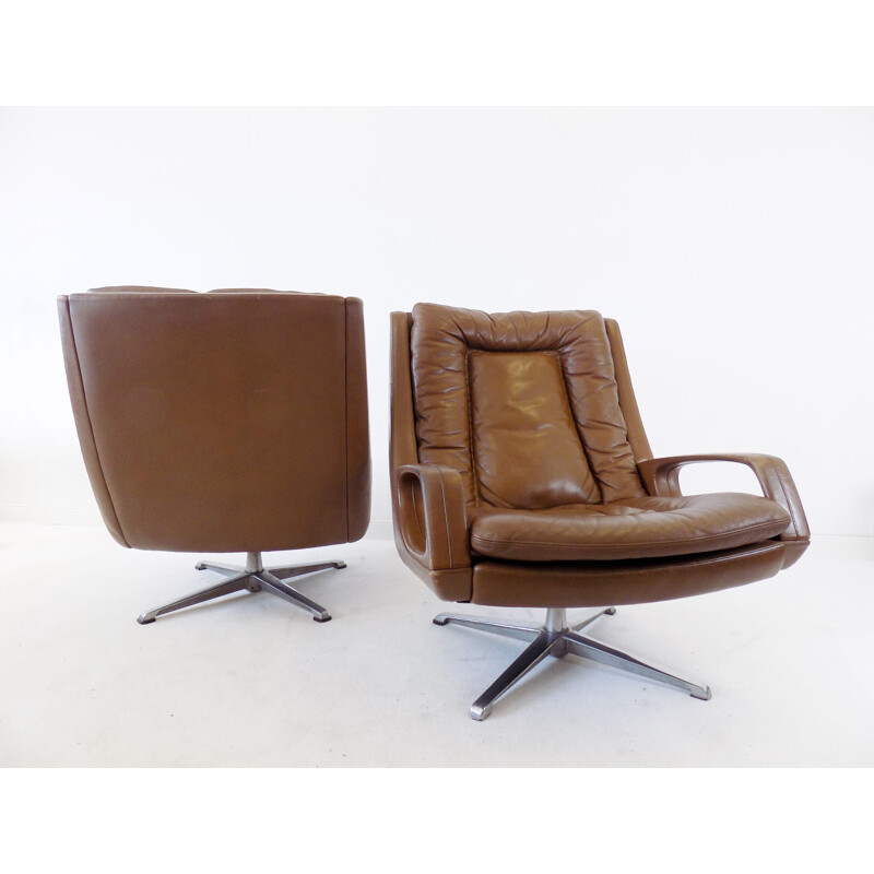 Pair of  brown leather lounge chairs by Carl Straub, 1960s