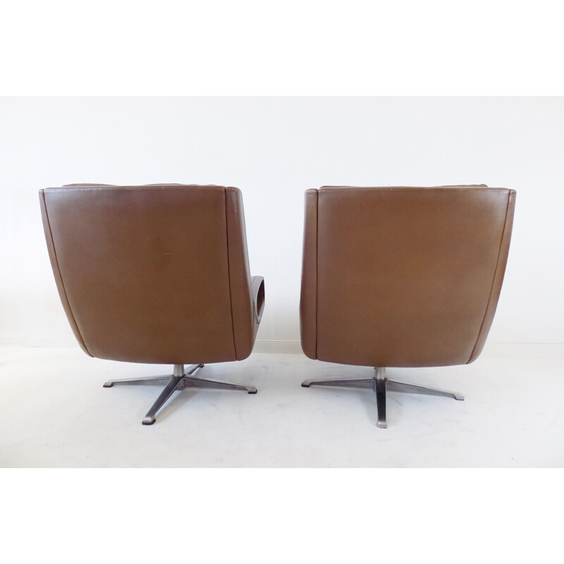 Pair of  brown leather lounge chairs by Carl Straub, 1960s