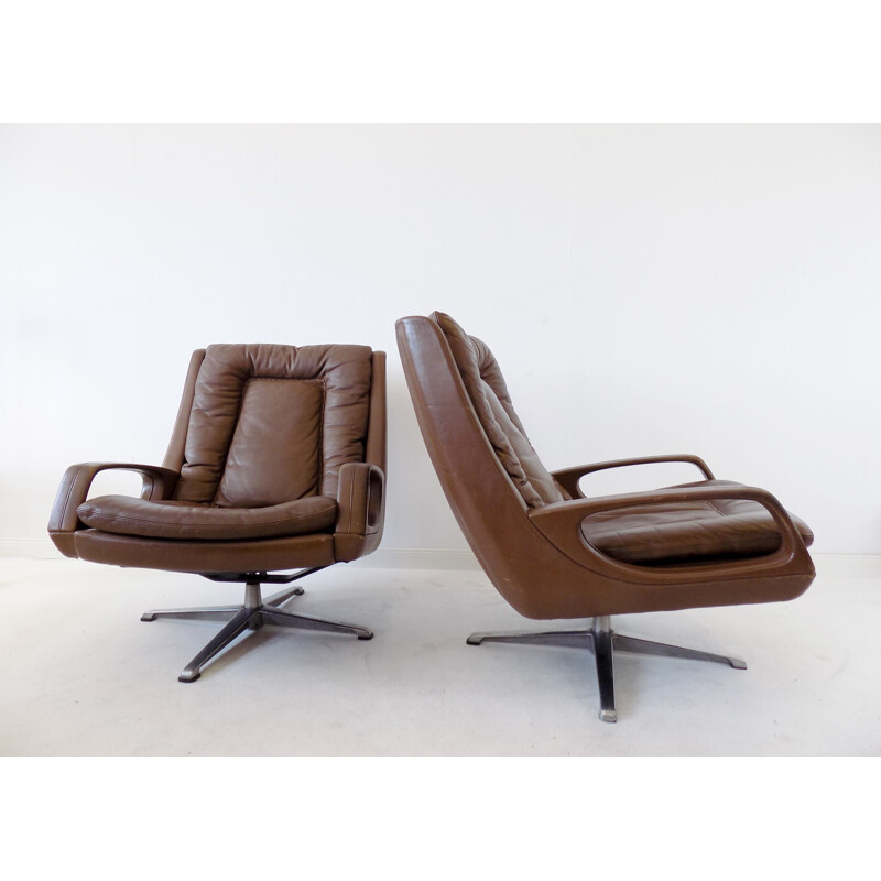 Pair of  brown leather lounge chairs by Carl Straub, 1960s