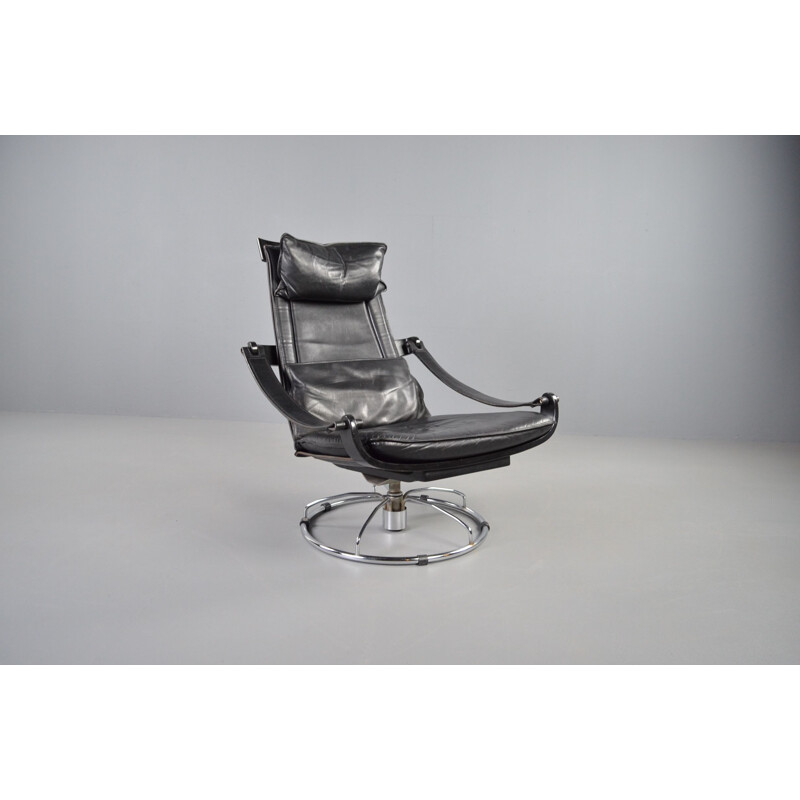 Vintage swivel armchair in black leather by Ake Fribytter for Nelo Möbel