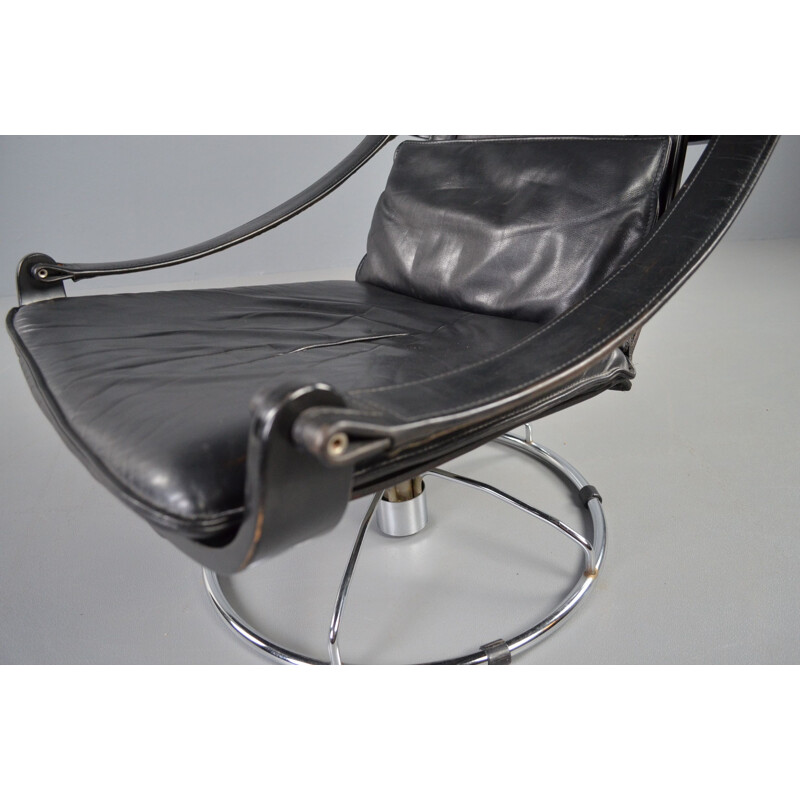 Vintage swivel armchair in black leather by Ake Fribytter for Nelo Möbel