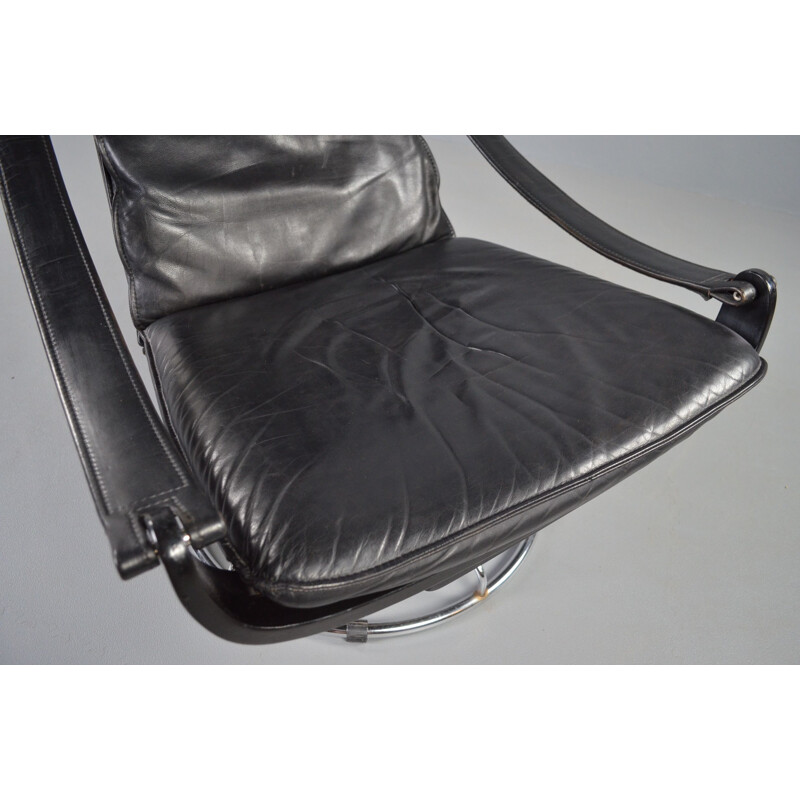 Vintage swivel armchair in black leather by Ake Fribytter for Nelo Möbel