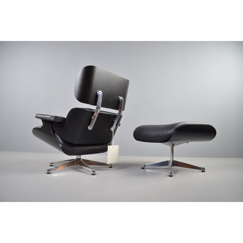 Fauteuil vintage avec ottoman par Vitra pour Charles & Ray Eames, 1956