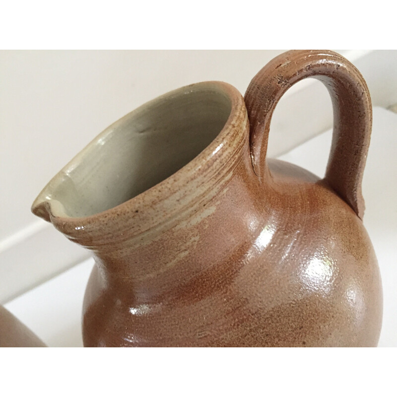 Set of 3 vintage enameled stoneware pitchers