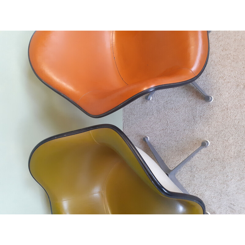 Pair of vintage PAC fiberglass armchairs by Eames for Herman Miller, 1960