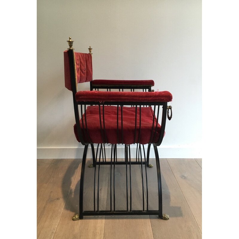 Red curule armchair in black iron and brass - 1970s