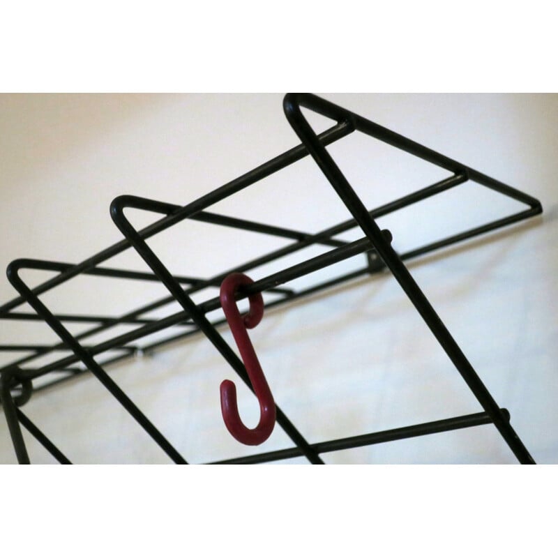 Mid-century wall mounted coat and hat rack in fine black metal, 1950s