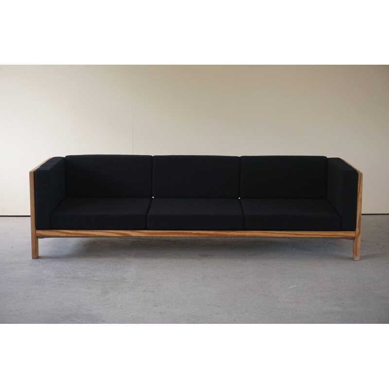 Vintage modern three seater sofa in oregon pine and reupholstered in wool, Denmark 1970s