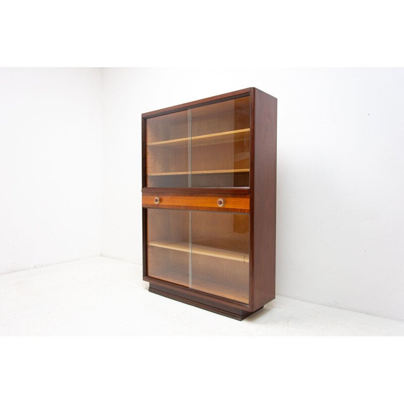 Mid century bookcase in walnut by Jindrich Halabala, Czechoslovakia 1950s