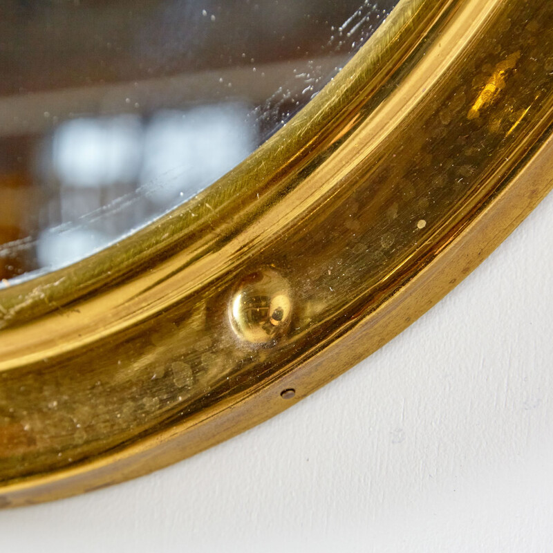 Vintage brass framed mirror