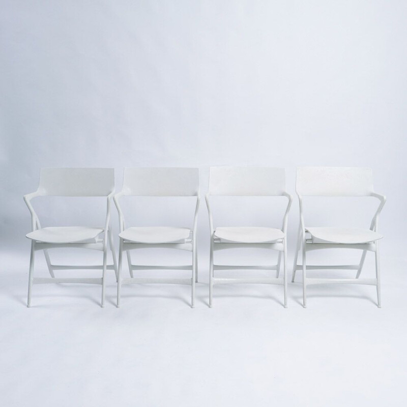 Set of 4 vintage folding chairs by Kartell