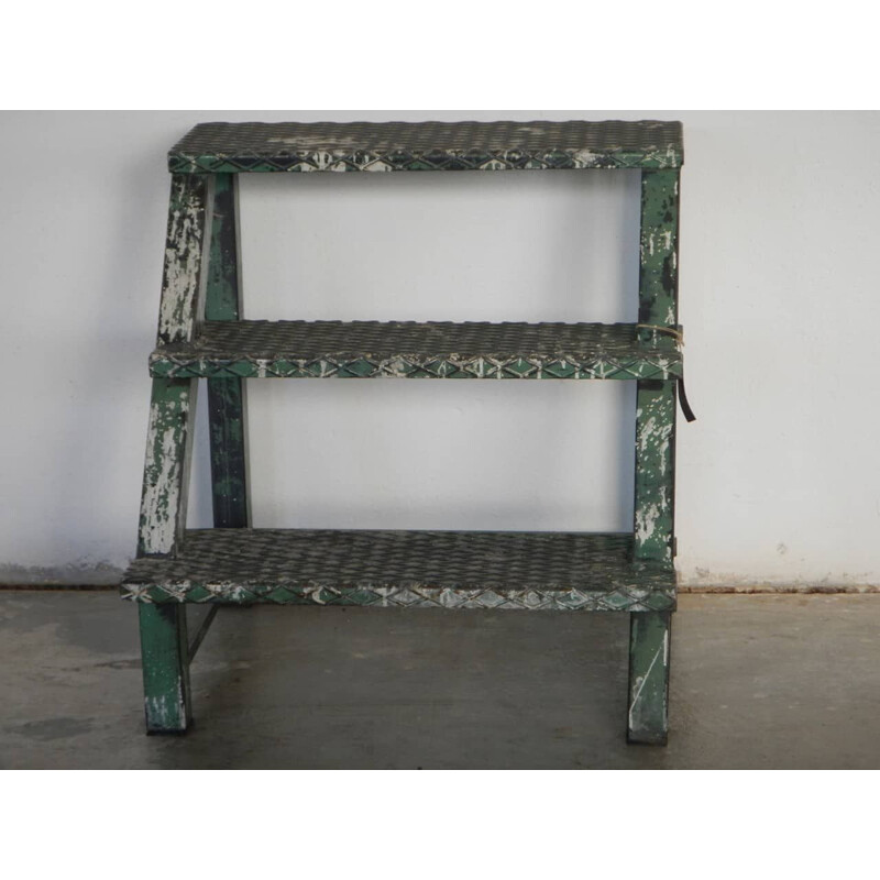 Vintage industrial iron ladder