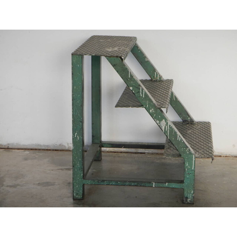 Vintage industrial iron ladder