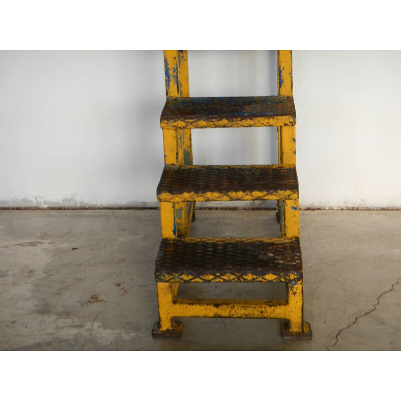 Vintage industrial iron ladder