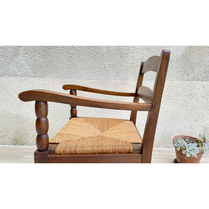 Vintage straw armchair by Charles Dudouyt