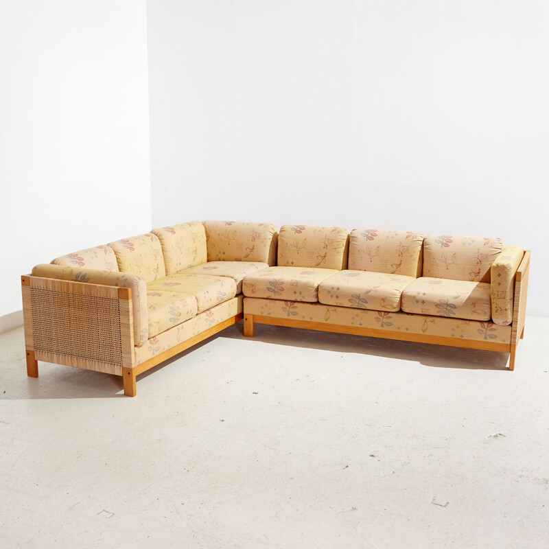Vintage wicker and upholstered cushions corner sofa